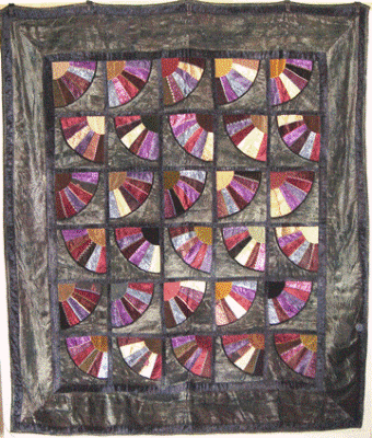 Velvet Quilt with hand stitched crazy stitching used as inspiration for digitised longarm quilting designs at www.houseofcreations.biz